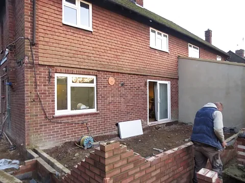 The back of the 1950s semi early in the job, with new brickwork going up