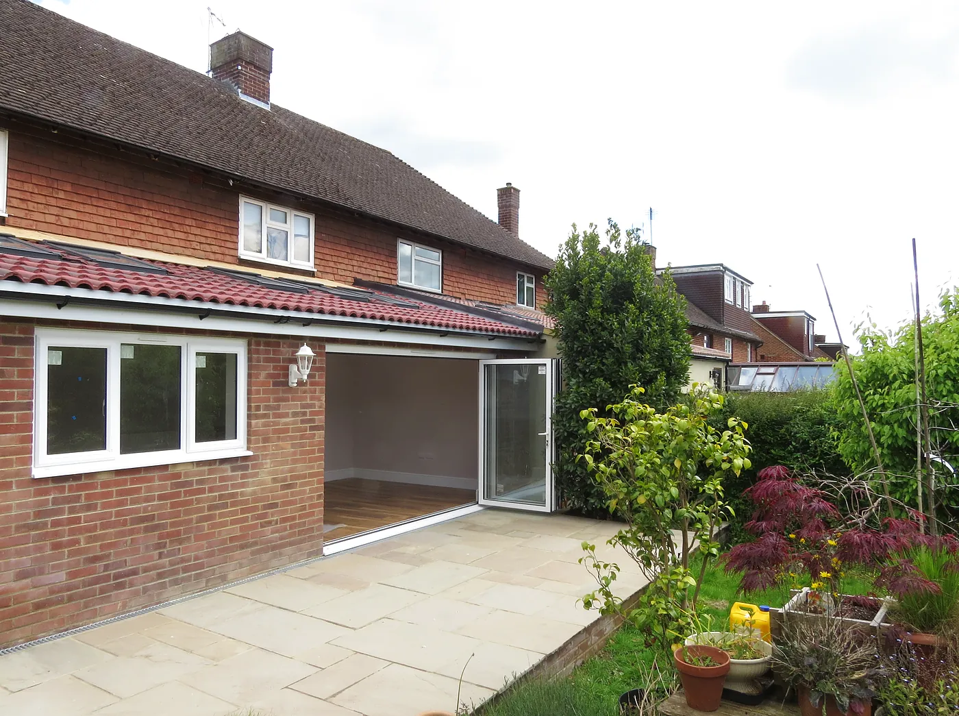 The renovated 1950s semi, opened up at the back with bifold doors