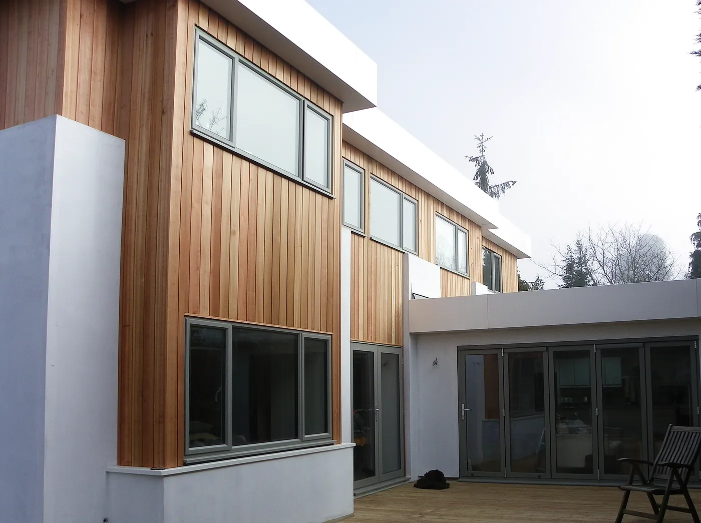 The finished rear from the deck, with the single-storey extension behind